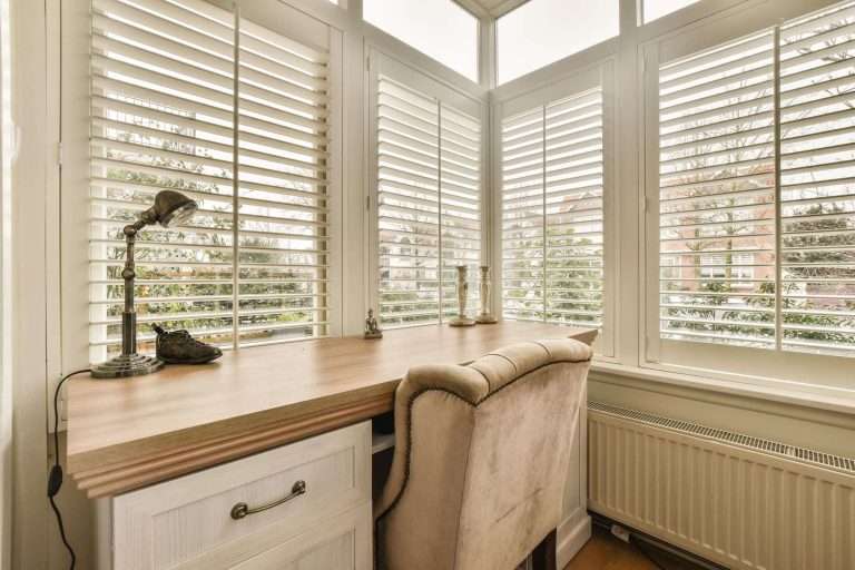 Plantation-shutters-that-perfectly-match-the-decor-in-a-Plympton-office-choosen-and-installed-by-us-from-our-indoor-blinds-range